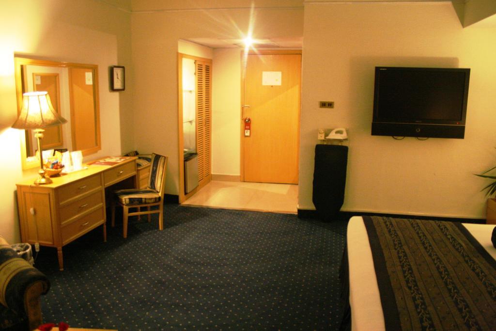 Smart Hotel Lahore Habitación foto